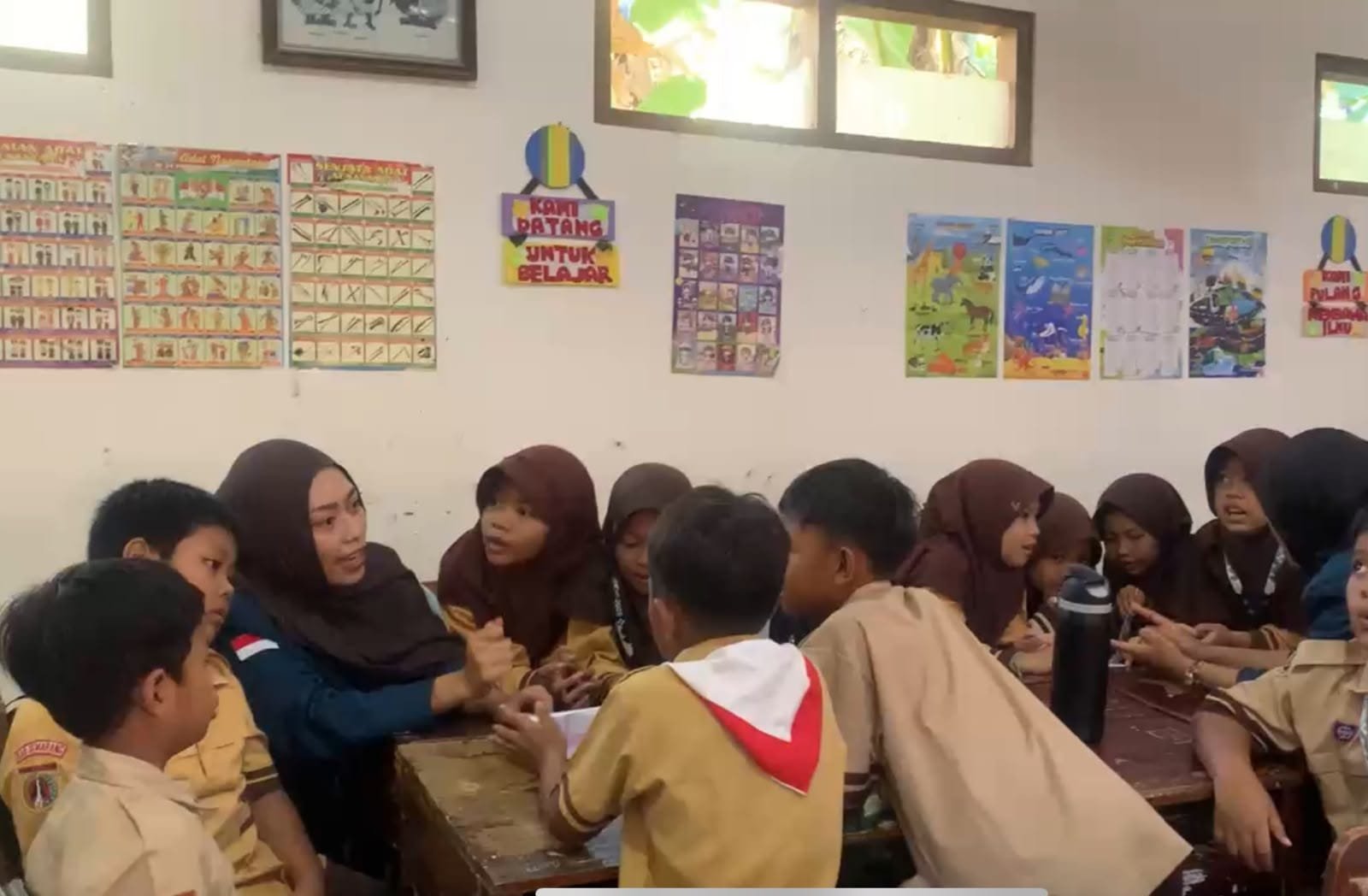 mengajar